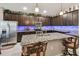 Modern kitchen with granite countertops and ample cabinetry at 12645 Flatwood Creek Dr, Gibsonton, FL 33534