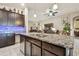 Spacious kitchen with granite island and stainless steel appliances at 12645 Flatwood Creek Dr, Gibsonton, FL 33534
