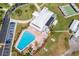 Community pool, clubhouse, and shuffleboard courts at 14052 89Th Ave, Seminole, FL 33776