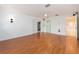 Spacious bedroom with wood flooring and an ensuite bathroom at 14052 89Th Ave, Seminole, FL 33776