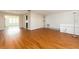 Spacious living room featuring wood-look floors and an open floor plan at 14052 89Th Ave, Seminole, FL 33776