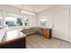 L-shaped office space with built-in desk and cabinets at 14052 89Th Ave, Seminole, FL 33776