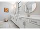 Modern bathroom with double vanity and quartz countertop at 14136 Swiss Bridge Dr, Riverview, FL 33579