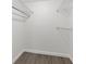 Large closet with wire shelving and hanging rod at 1524 Lakeview Rd # 305, Clearwater, FL 33756