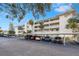 Two-story building with covered parking and landscaped grounds at 1524 Lakeview Rd # 305, Clearwater, FL 33756