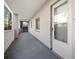 Clean and well-lit hallway with access to condo units at 1524 Lakeview Rd # 305, Clearwater, FL 33756
