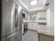 Modern kitchen with stainless steel appliances and granite countertops at 1524 Lakeview Rd # 305, Clearwater, FL 33756