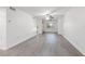Open concept living room featuring wood-look floors at 1524 Lakeview Rd # 305, Clearwater, FL 33756