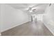 Spacious living room with wood-look floors and open concept at 1524 Lakeview Rd # 305, Clearwater, FL 33756