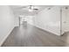 Bright and airy living room with wood-look flooring at 1524 Lakeview Rd # 305, Clearwater, FL 33756