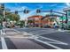 Quaint town square with shops and a bicycle rider at 1701 Pinehurst Rd # 33A, Dunedin, FL 34698