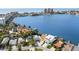 Aerial view of waterfront homes and boats near the ocean at 17744 1St E St, Redington Shores, FL 33708