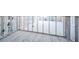 Under construction interior with exposed framing and new flooring at 17744 1St E St, Redington Shores, FL 33708