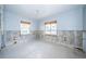 A kitchen currently under renovation, featuring new flooring and exposed framing at 17744 1St E St, Redington Shores, FL 33708