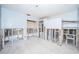 Kitchen in the midst of a complete renovation, showing exposed framing and new flooring at 17744 1St E St, Redington Shores, FL 33708