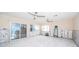 Bright living room with large windows and new flooring, currently under renovation at 17744 1St E St, Redington Shores, FL 33708
