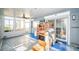 Sunroom with moving boxes, awaiting final staging and decor at 17744 1St E St, Redington Shores, FL 33708