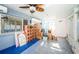 Sunroom with boxes and moving supplies, awaiting finishing touches at 17744 1St E St, Redington Shores, FL 33708