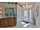 Bright and spacious entry with decorative accents at 1943 S Pebble Beach Blvd, Sun City Center, FL 33573