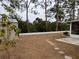 Backyard with storage shed and stepping stones at 237 Orduna Dr, North Port, FL 34287