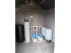 Interior view of a utility room with water pumps and tanks at 237 Orduna Dr, North Port, FL 34287