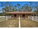 Two-stall barn with wooden exterior at 249 Dogwood Trce, Tarpon Springs, FL 34688