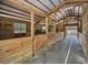 Empty stalls in a rustic barn at 249 Dogwood Trce, Tarpon Springs, FL 34688