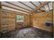 Empty horse stall with wooden walls at 249 Dogwood Trce, Tarpon Springs, FL 34688