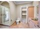 Bathroom with walk-in shower, toilet and large closet at 249 Dogwood Trce, Tarpon Springs, FL 34688