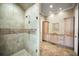 Bathroom with a walk-in shower and double vanity at 249 Dogwood Trce, Tarpon Springs, FL 34688