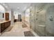 Spacious bathroom with a large walk-in shower and double sinks at 249 Dogwood Trce, Tarpon Springs, FL 34688