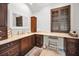 Elegant bathroom with vanity, large mirror, and plantation shutters at 249 Dogwood Trce, Tarpon Springs, FL 34688