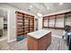 Large walk-in closet, island, and plenty of storage at 249 Dogwood Trce, Tarpon Springs, FL 34688
