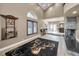 Game room features a pool table and a view into the home bar and living room at 249 Dogwood Trce, Tarpon Springs, FL 34688