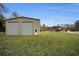 Spacious two-car garage with additional storage space at 249 Dogwood Trce, Tarpon Springs, FL 34688