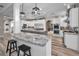Spacious kitchen with large island, stainless steel appliances, and white cabinetry at 249 Dogwood Trce, Tarpon Springs, FL 34688