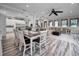 Open floor plan boasts a farmhouse-style kitchen and spacious Gathering room at 249 Dogwood Trce, Tarpon Springs, FL 34688