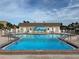 Inviting community pool with surrounding patio at 322 Boca Ciega Point N Blvd, St Petersburg, FL 33708