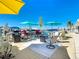 Relaxing dockside patio features umbrellas and seating at 322 Boca Ciega Point N Blvd, St Petersburg, FL 33708