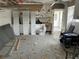 Unfinished garage with workbench and toilet at 322 Boca Ciega Point N Blvd, St Petersburg, FL 33708
