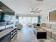 Spacious living room with sectional sofa and fireplace at 322 Boca Ciega Point N Blvd, St Petersburg, FL 33708