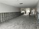 Under construction living room with kitchen access at 322 Boca Ciega Point N Blvd, St Petersburg, FL 33708