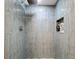 Shower with blue-gray tile and pebble accents at 322 Boca Ciega Point N Blvd, St Petersburg, FL 33708