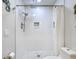 Shower with white tile and pebble floor at 322 Boca Ciega Point N Blvd, St Petersburg, FL 33708