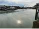 Calm water view with boats and houses at 322 Boca Ciega Point N Blvd, St Petersburg, FL 33708