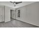 Spacious bedroom with mirrored closet doors and a window at 3332 Vorden St, New Port Richey, FL 34655