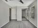 Bright bedroom with mirrored closet doors and window at 3332 Vorden St, New Port Richey, FL 34655