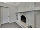 Living room featuring a white brick fireplace at 3332 Vorden St, New Port Richey, FL 34655