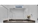 Bathroom with double vanity and large mirror at 34104 White Fountain Ct, Wesley Chapel, FL 33545
