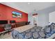 Main bedroom with king-size bed and workspace at 34104 White Fountain Ct, Wesley Chapel, FL 33545